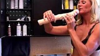 Sexy mature blonde in a tool belt porn video